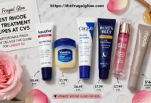 Five CVS drugstore lip treatment dupes arranged beside a Rhode Peptide Lip Treatment tube on a white marble surface showing the price difference