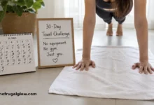 A white bath towel laid out on a floor next to a pair of hands. In the background, a person is doing a plank with their hands on the towel. A 30-day calendar is in the corner.