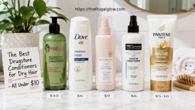Five drugstore conditioners for dry hair arranged on a white surface: Mielle Organics Rosemary Mint, Dove Intensive Repair, Kristin Ess Leave-In, Tresemmé Pro Pure, and Pantene Daily Moisture Renewal. Price tags show $5-10 each.