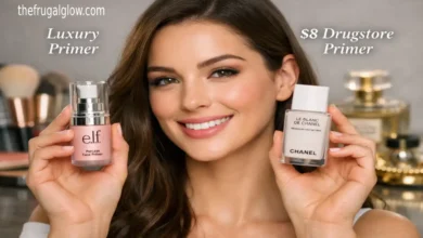 A beautiful young woman with flawless, glowing skin holding two face primer bottles next to her face, comparing an affordable $8 drugstore primer with an expensive luxury brand for pore filling.