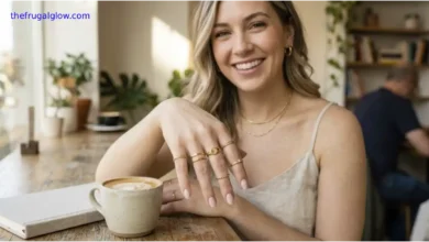 A smiling fair-skinned woman wearing trendy gold-tone budget rings, demonstrating affordable jewelry care hacks and daily fashion styling.