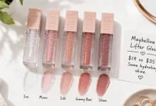 The Maybelline Lifter Gloss in multiple shades including Ice, Moon, Silk, and Gummy Bear. A sign says "$14 vs $35 – Same non-sticky shine."