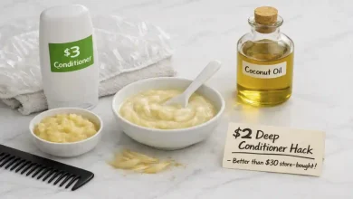 A cheap drugstore conditioner, a bottle of coconut oil, and a bowl of the mixed conditioner. A small sign says "$2 Deep Conditioner Hack – Better than $30 masks."