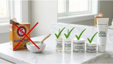 Box of baking soda and a small bowl of white paste next to five safe blackhead treatment alternatives including salicylic acid, niacinamide, and clay mask on a white marble counter – dermatologist-approved skincare routine.